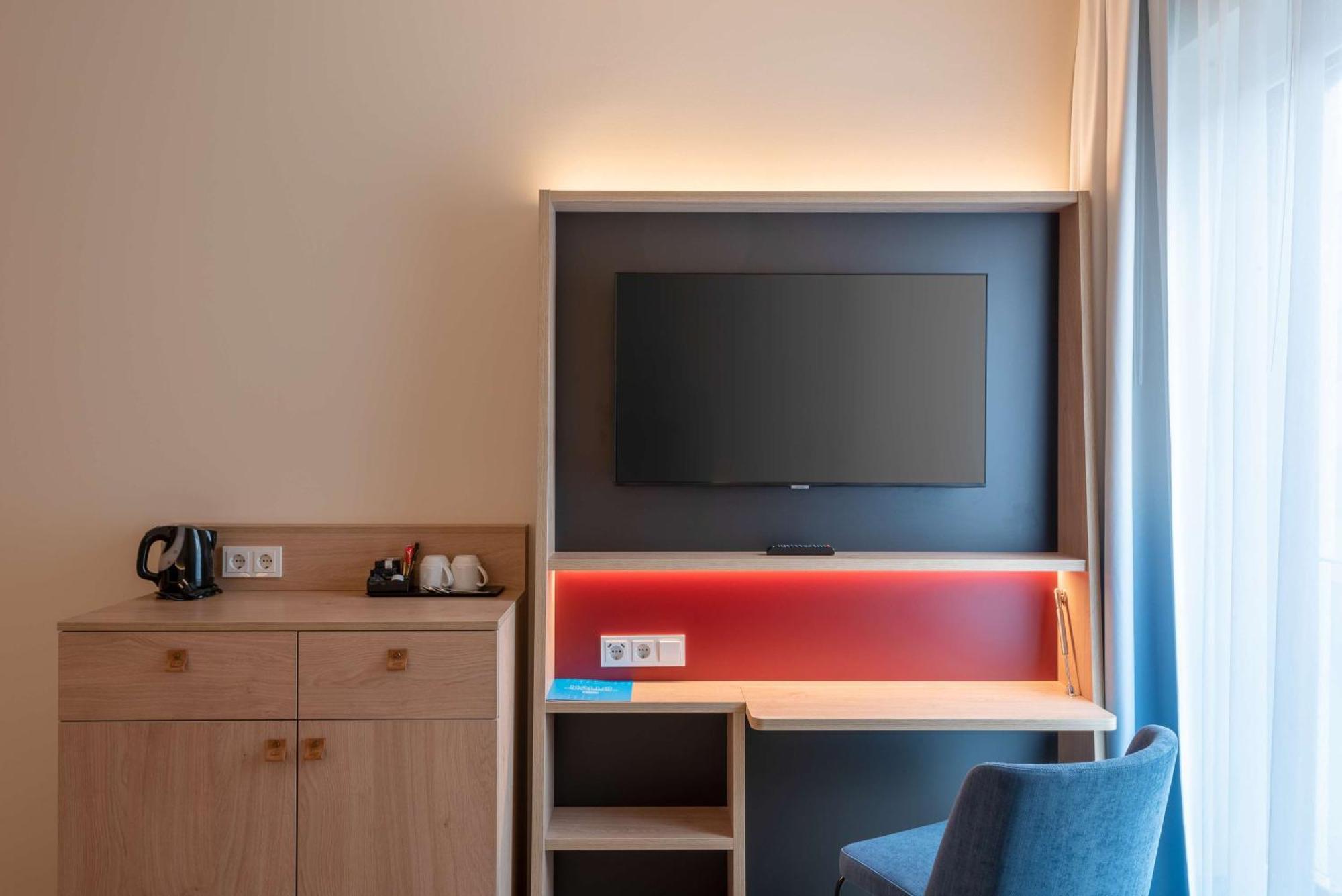 Zimmer mit Queensize-Bett und Schlafsofa